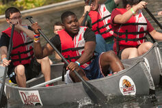 Students in canoes racing in the annual IU Indianapolis Regatta.